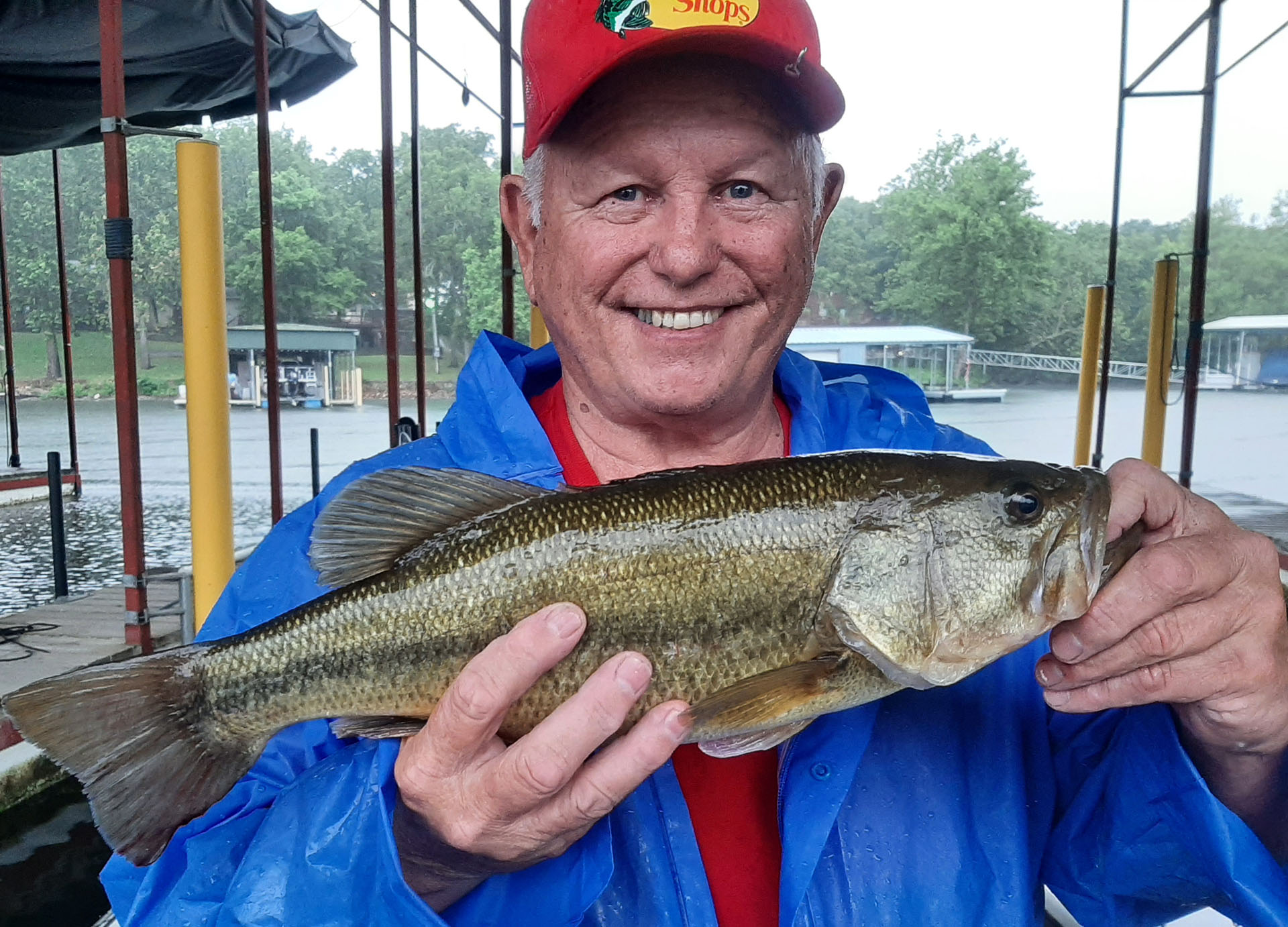 Photo of Mike holding Bass fish